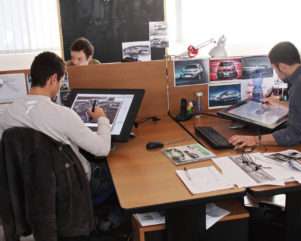 JAC Design Center - Multiple designers working in office